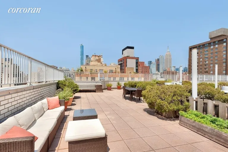 New York City Real Estate | View 301 East 22Nd Street, 5F | Building rooftop garden | View 7