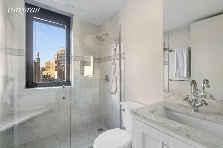 New York City Real Estate | View 100 United Nations Plaza, 14G | Renovated primary bathroom with heated flooring | View 6