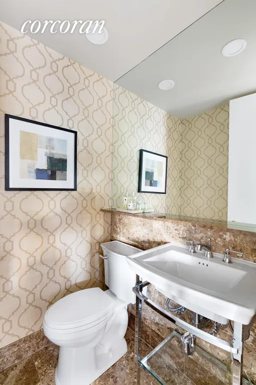 New York City Real Estate | View 100 United Nations Plaza, 14G | Renovated guest powder room | View 9