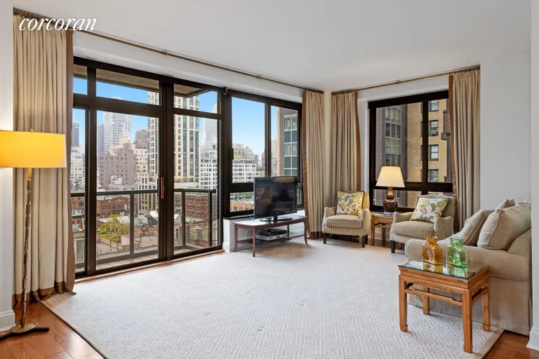 New York City Real Estate | View 100 United Nations Plaza, 14G | Living room with open city views to the north | View 3