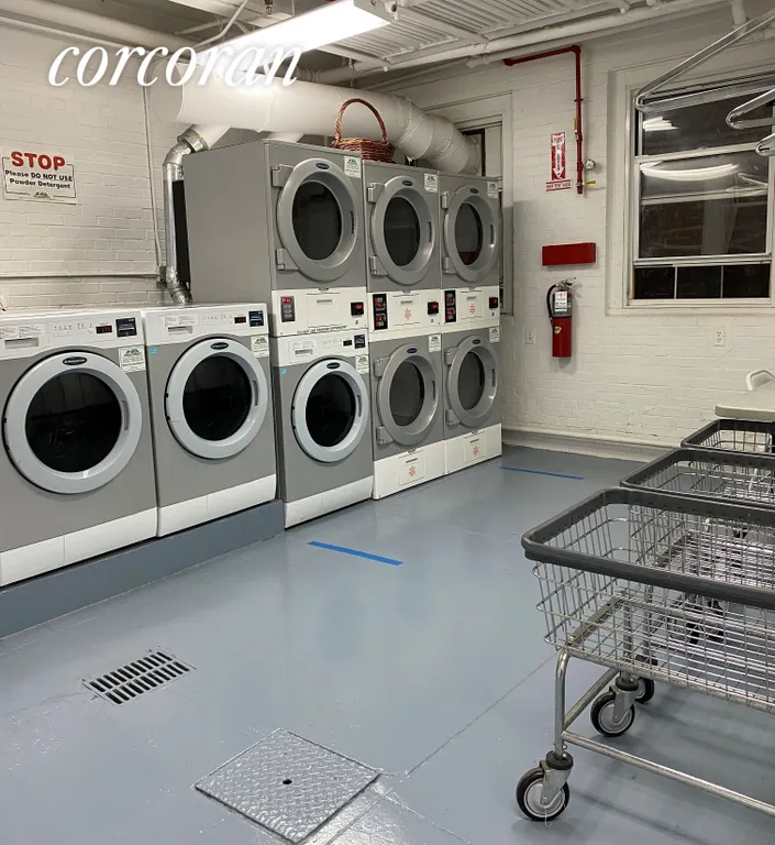 New York City Real Estate | View 125 East 74th Street, 3C | Building Laundry Room | View 14