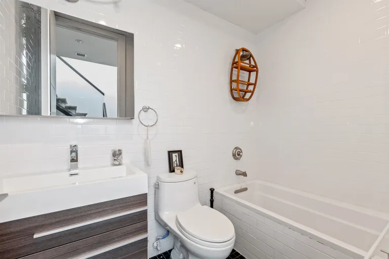 New York City Real Estate | View 821 DeKalb Avenue, 3 | Crisp hall bathroom | View 7