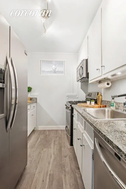 New York City Real Estate | View 303 West 66th Street, 5CE | Tons of cabinet space, granite counters | View 5