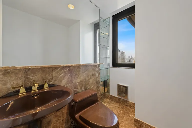 New York City Real Estate | View 100 United Nations Plaza, 32E | Windowed powder room | View 6