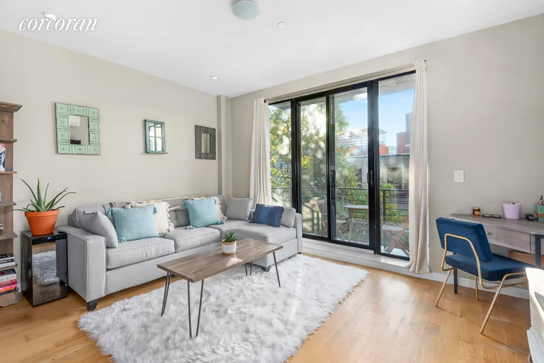 New York City Real Estate | View 516 Classon Avenue, 3C | Light filled living room w/balcony. | View 2