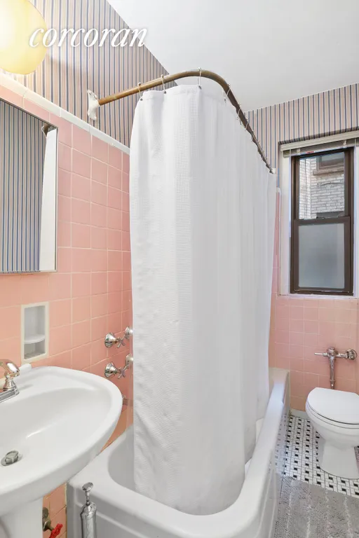 New York City Real Estate | View 225 West 25th Street, 4L | Large Windowed Bathroom | View 5