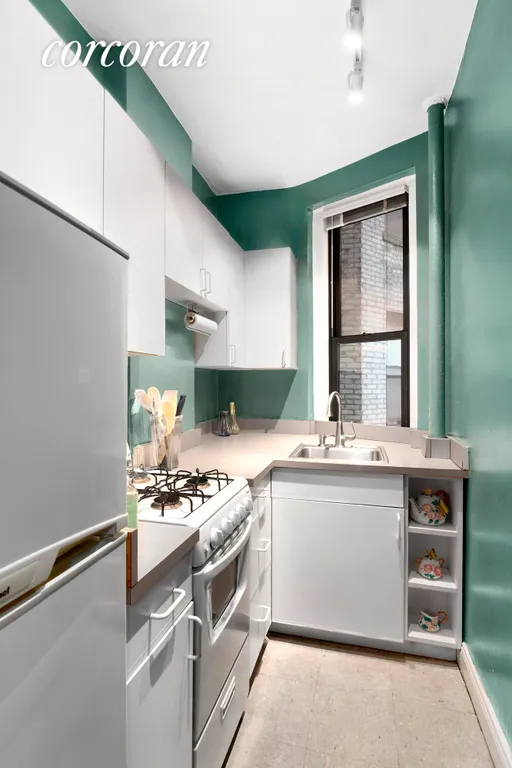 New York City Real Estate | View 225 West 25th Street, 4L | Separate, Windowed Kitchen | View 4