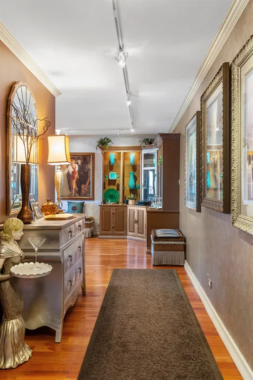 New York City Real Estate | View 115 East 87th Street, 19F | 16' Gallery Entrance w/Walk-in-Closet | View 2