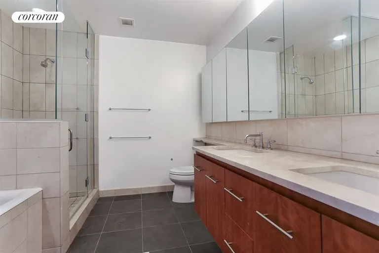 New York City Real Estate | View 255 Hudson Street, 4B | Spa Bathroom with soaking tub and shower. | View 6