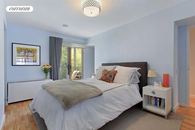 New York City Real Estate | View 126 Waverly Place, 2E | Master bedroom leading to private terrace | View 4