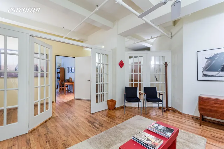 New York City Real Estate | View 14 East 4th Street, 407 | Waiting Area with French Doors | View 3