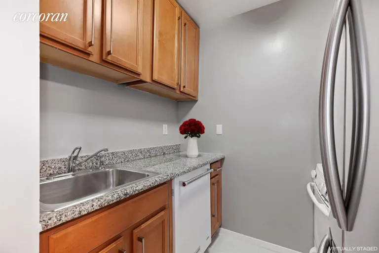 New York City Real Estate | View 393 West 49th Street, 2Q | Kitchen | View 9