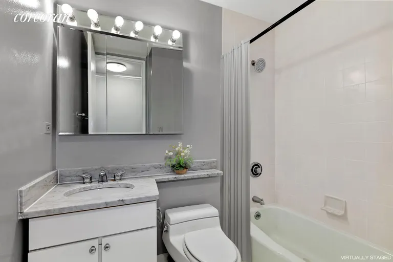New York City Real Estate | View 393 West 49th Street, 2Q | Bathroom | View 10