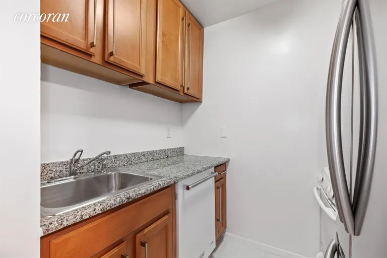 New York City Real Estate | View 393 West 49th Street, 2Q | Kitchen | View 11