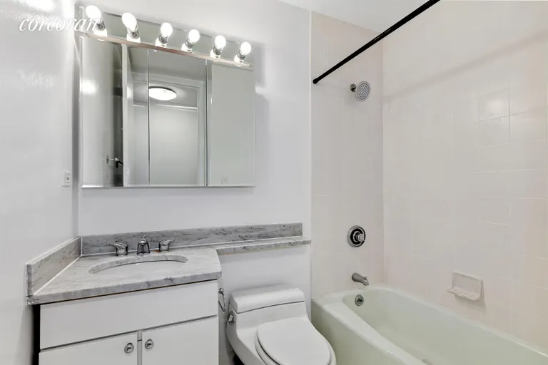 New York City Real Estate | View 393 West 49th Street, 2Q | Bathroom | View 12