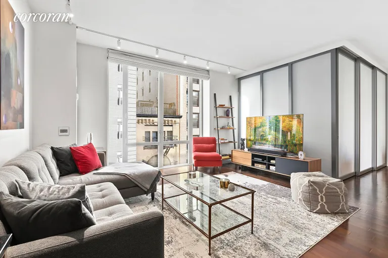 New York City Real Estate | View 130 West 19th Street, 8B | Living Room with Home Office | View 2