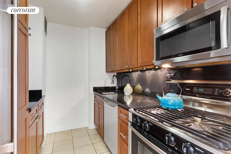 New York City Real Estate | View 382 Central Park West, 12F | Well-appointed kitchen with stainless appliances | View 4