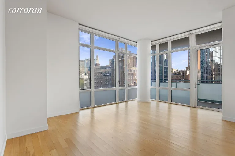 New York City Real Estate | View 325 Fifth Avenue, 25D | Floor to ceiling windows in the living/dining area | View 2