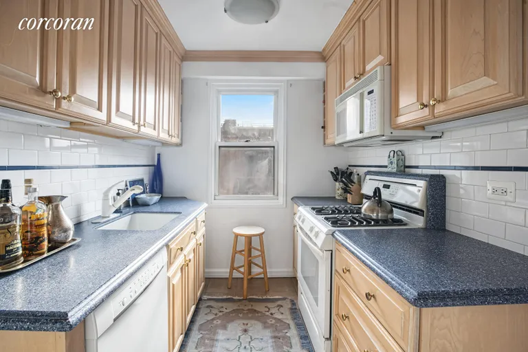 New York City Real Estate | View 3 Sheridan Square, 5D | South-facing large windowed kitchen | View 4