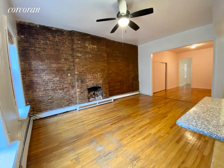 New York City Real Estate | View 449 Henry Street, 1 | Exposed Bricks & Decorative fireplace | View 4