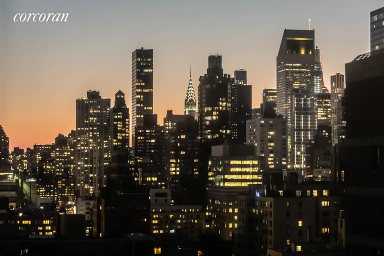 New York City Real Estate | View 353 East 72Nd Street, 24B | Looking South at sunset | View 2