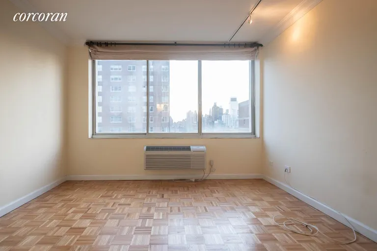 New York City Real Estate | View 353 East 72Nd Street, 24B | View South in the king-sized bedroom w WIC | View 13