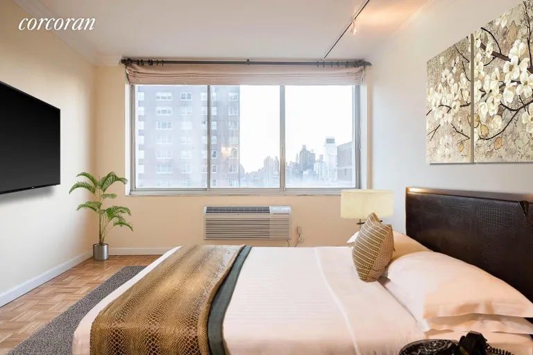 New York City Real Estate | View 353 East 72Nd Street, 24B | Bedroom virtually furnished towards window. | View 5