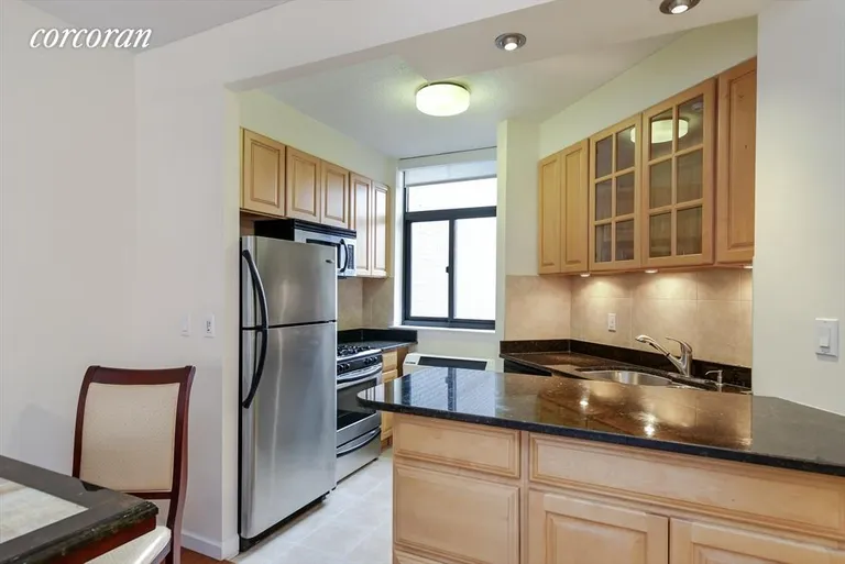 New York City Real Estate | View 303 East 43rd Street, 18C | Kitchen with Stainless Steel Appliances | View 3