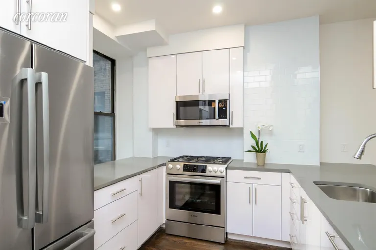 New York City Real Estate | View 104 West 70th Street, 6B | Open Windowed Kitchen | View 7