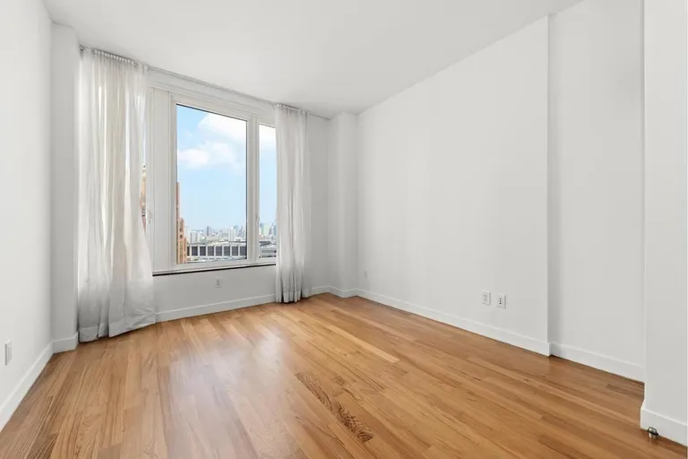 New York City Real Estate | View 15 William Street, 22F | Living Room | View 3