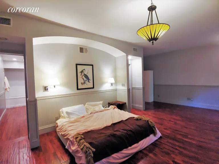New York City Real Estate | View 20 College Place | Downstairs master bed with two walk-in closets | View 6