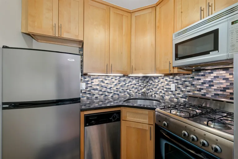 New York City Real Estate | View 321 East 48th Street, 7K | Kitchen | View 2