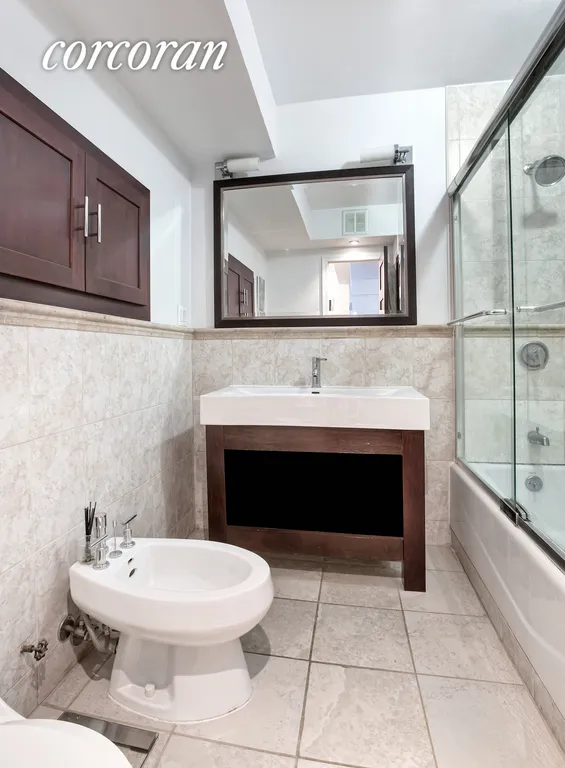 New York City Real Estate | View 240 East 46th Street, 6G | Very large bathroom with nice renovations | View 5