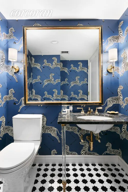 New York City Real Estate | View 15 West 63rd Street, 15A | Powder Room with Salamandre Wallpap | View 7