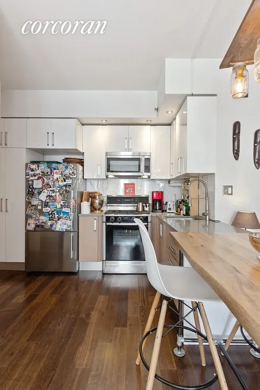 New York City Real Estate | View 100 Maspeth Avenue, 2J | Open Chef's Kitchen with Dining Area | View 2