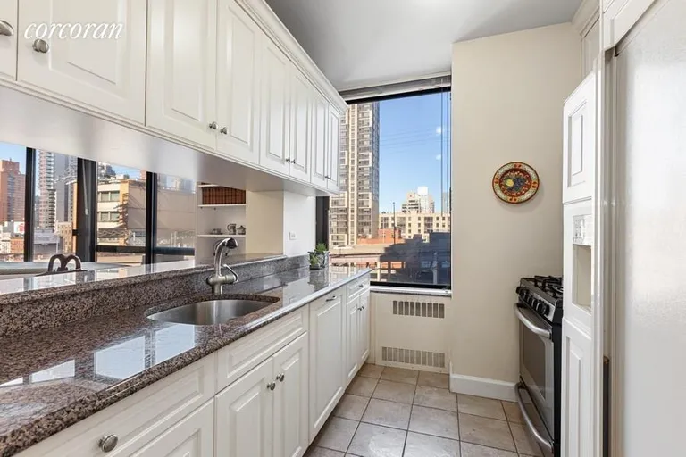 New York City Real Estate | View 418 East 59th Street, 9B | Open Kitchen with Window | View 3