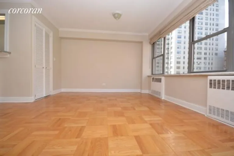 New York City Real Estate | View 420 East 55th Street, 10E | Corner Living and Dining | View 4
