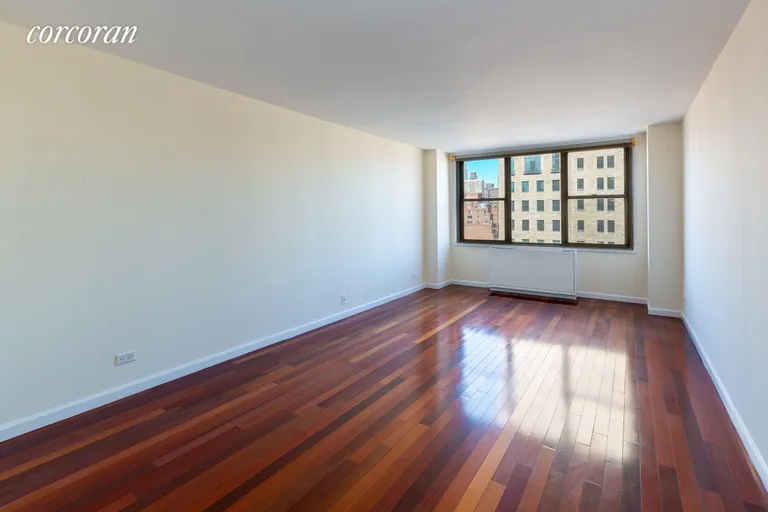 New York City Real Estate | View 301 East 79th Street, 21D | Living Room with Dining Area | View 4