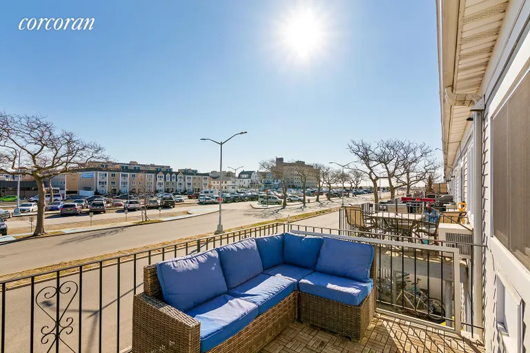 New York City Real Estate | View 197 Cross Bay Pkwy | Living Room Terrace | View 2