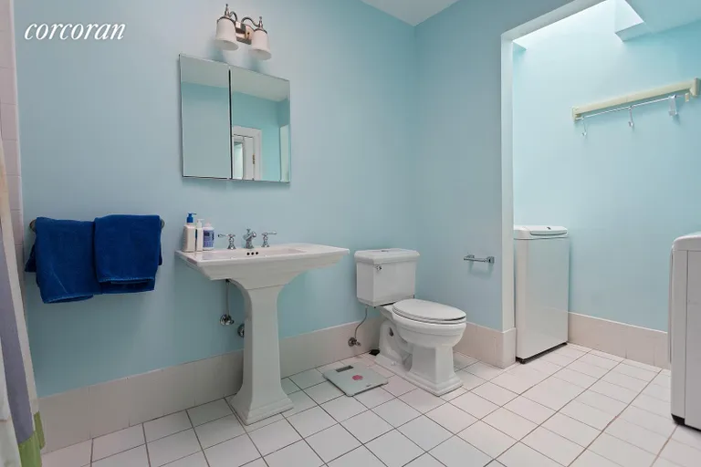 New York City Real Estate | View 231 West 139th Street | Bathroom with W/D | View 9