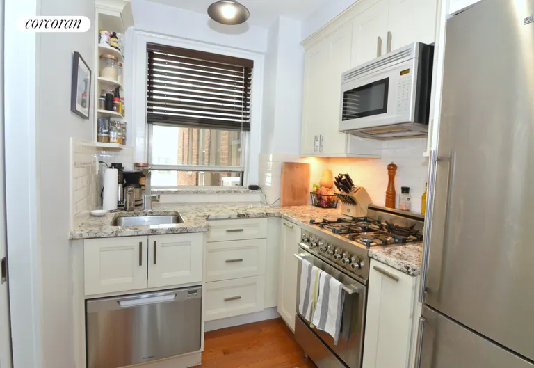 New York City Real Estate | View 333 East 43rd Street, 511 | Stainless  Steel Windowed Kitchen | View 3