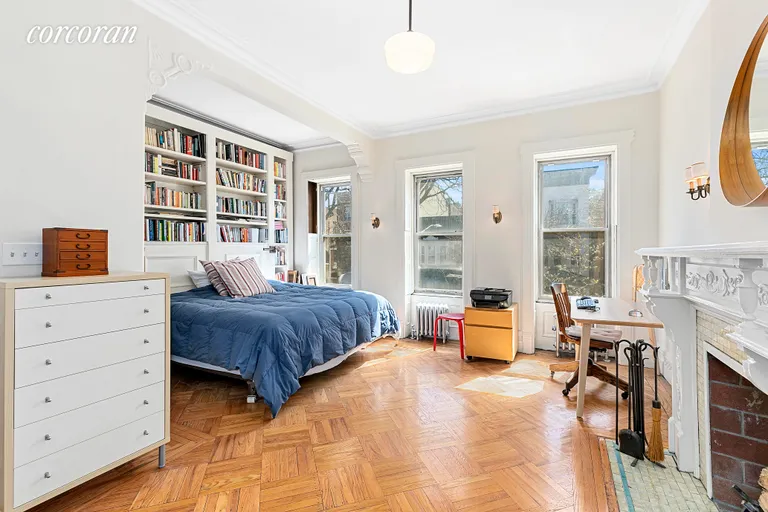 New York City Real Estate | View 323 Park Place | The primary bedroom boasts three tall windows. | View 6