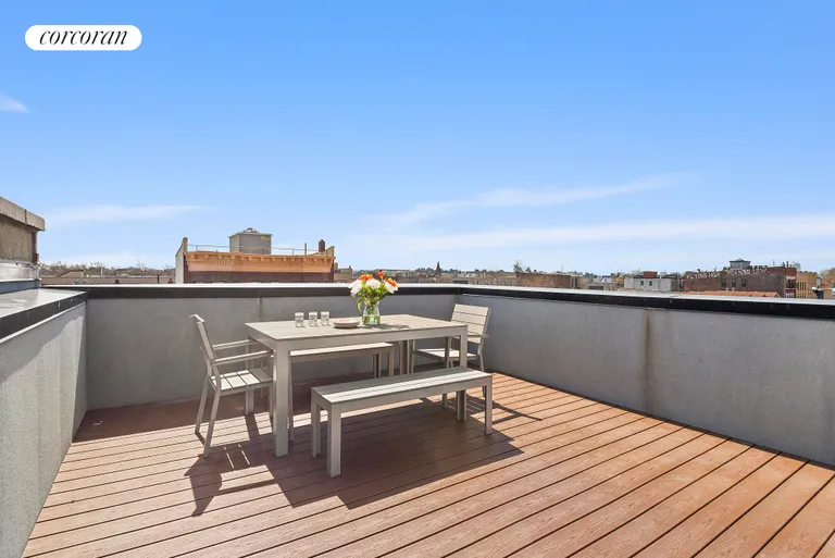 New York City Real Estate | View 541 Kosciuszko Street | Finished roof deck with city views! | View 12