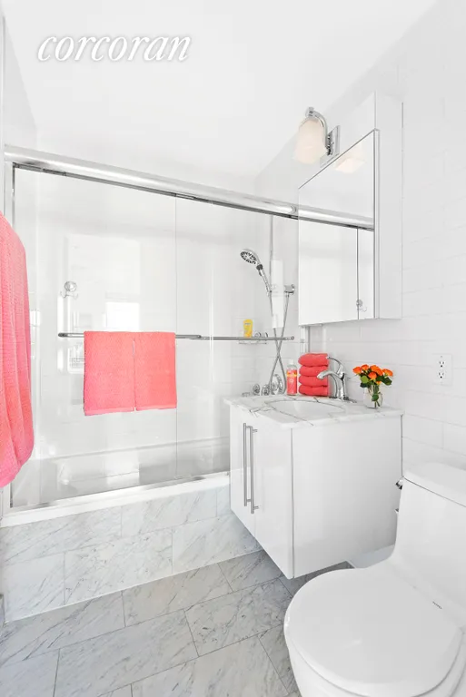 New York City Real Estate | View 667 CARROLL STREET, 3 | The en-suite bath: white fixtures & marble floor. | View 8