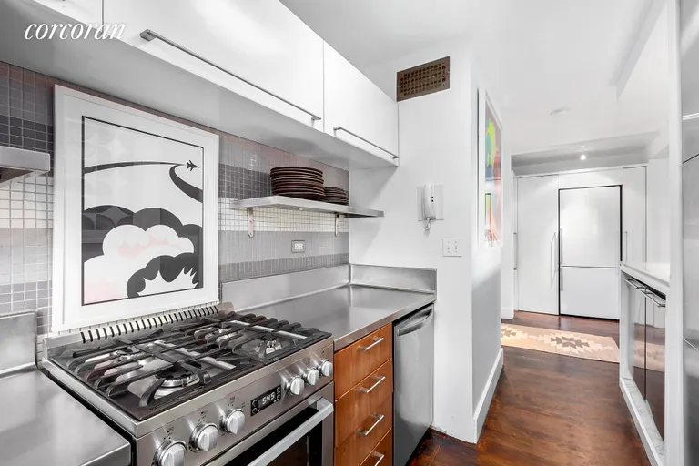 New York City Real Estate | View 201 West 21st Street, PH | Kitchen with Wood and Stainless Ste | View 7