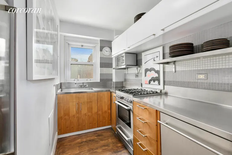 New York City Real Estate | View 201 West 21st Street, PH | Windowed Industrial Feel Kitchen | View 6