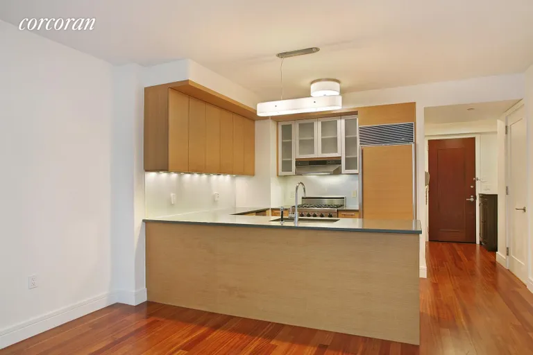 New York City Real Estate | View 30 West Street, 15C | Open Chefs Kitchen | View 2