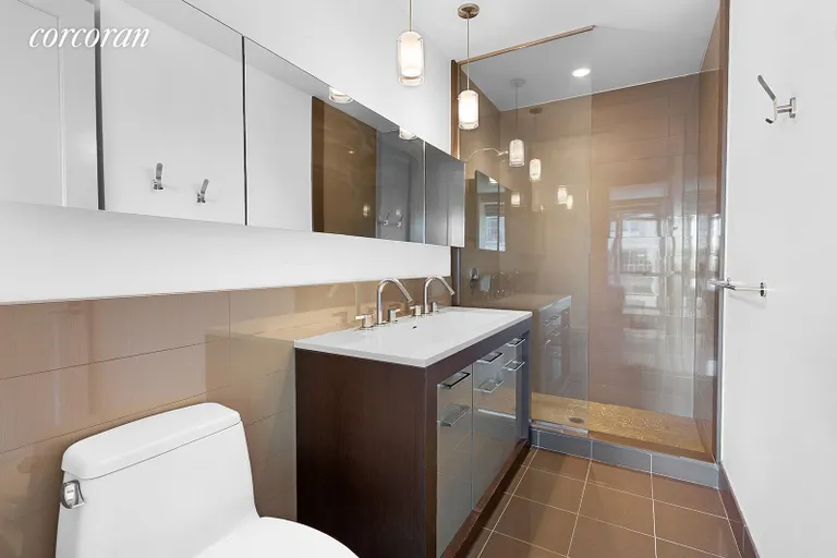 New York City Real Estate | View 125 North 10th Street, S3E | Primary Bathroom En-suite with Stall Shower | View 6