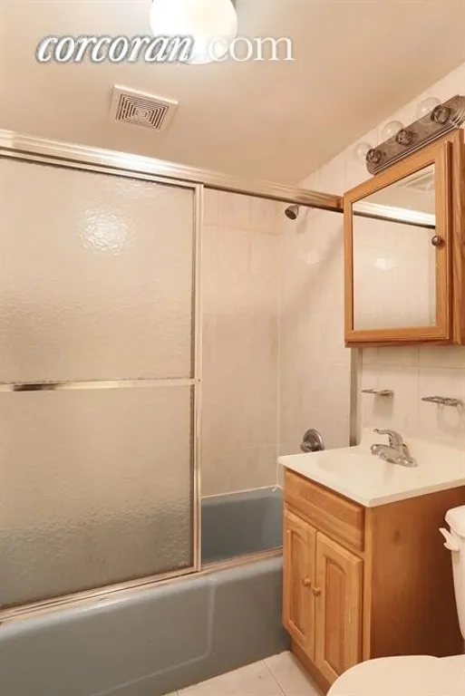 New York City Real Estate | View 3 Doyers Street, 5B | Full Size Bathroom with Tub | View 4