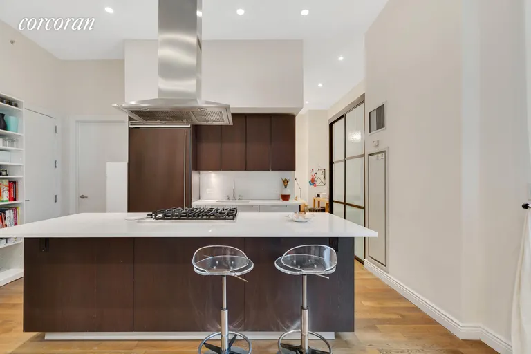 New York City Real Estate | View 225 Fifth Avenue, 2N | Open kitchen with Bar Seating | View 3